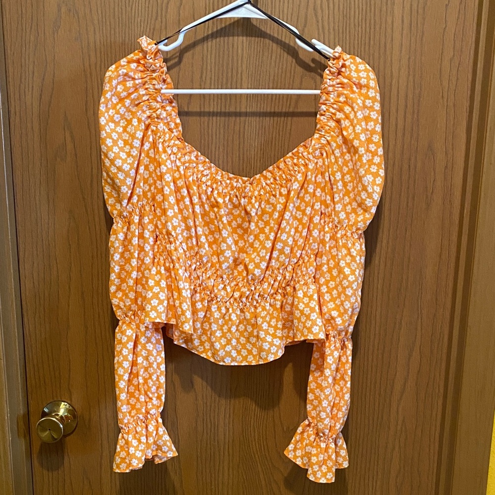 Divided Orange Floral Blouse